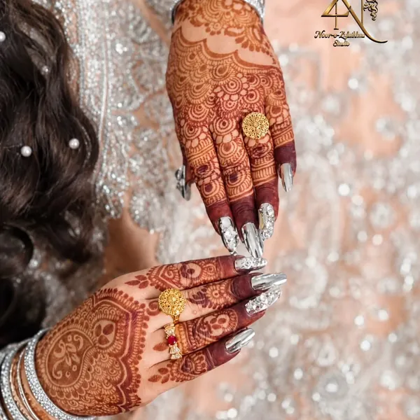 Bridal mehndi hands photographed for Noor-e-Zulaikha Studio